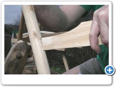 Green wood worker making a chair